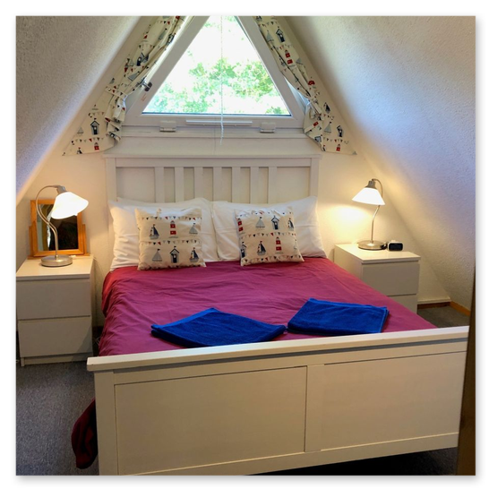 Comfortable bed with clothes storage area