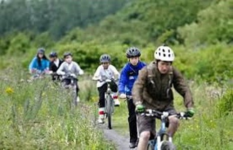 Picture of family cycling on kent coast
